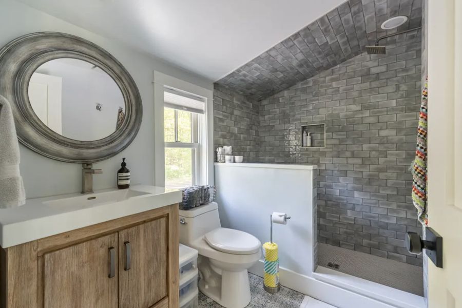 Bathroom with walk-in tiled shower