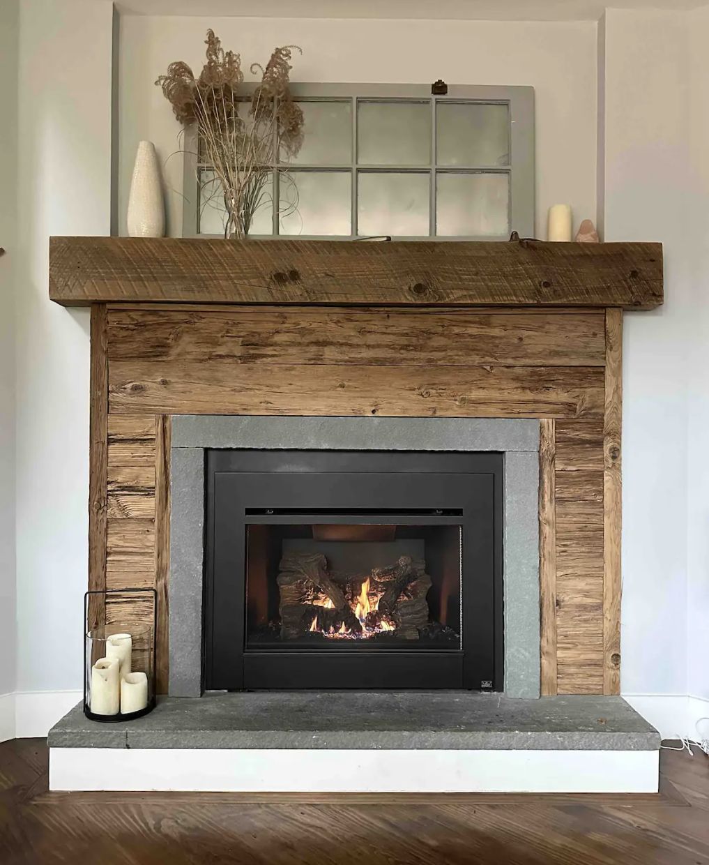 Gas fireplace with reclaimed-wood surround